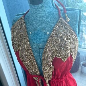 Elegant Red Halter Dress with Gold Embellishments